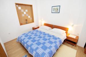 Postel nebo postele na pokoji v ubytování Apartment Zadar - Diklo 5880c