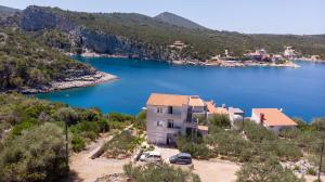 an aerial view of a house next to a lake at Apartments by the sea Cove Pokrivenik, Hvar - 4604 in Gdinj