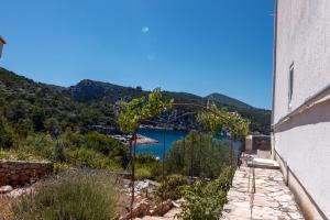 a view of a lake from a building at Apartments by the sea Cove Pokrivenik, Hvar - 4604 in Gdinj