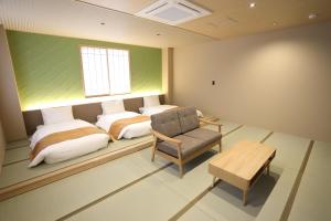 宮若温泉郷 宮若虎の湯 Miyawaka Toranoyu客房内的一张或多张床位