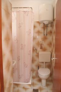 Koupelna v ubytování Studio Trstenik 4566b