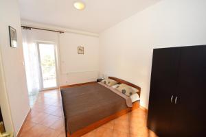 Postel nebo postele na pokoji v ubytování Apartments and rooms by the sea Orebic, Peljesac - 4517
