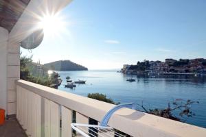 a balcony with a view of a body of water at Apartments by the sea Brna, Korcula - 4425 in Smokvica