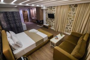 Postel nebo postele na pokoji v ubytování Vecchia Boutique Hotel