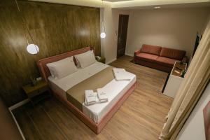 Postel nebo postele na pokoji v ubytování Vecchia Boutique Hotel
