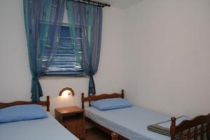Posteľ alebo postele v izbe v ubytovaní Apartment Zarace - Gdinj 4598a