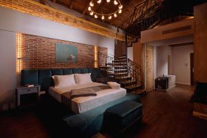 Postel nebo postele na pokoji v ubytování Vecchia Boutique Hotel