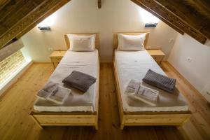 Postel nebo postele na pokoji v ubytování Vecchia Boutique Hotel