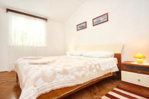 Posteľ alebo postele v izbe v ubytovaní Apartments by the sea Korcula - 4367