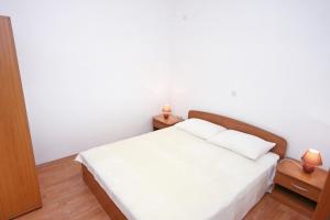 Posteľ alebo postele v izbe v ubytovaní Apartments with a parking space Lumbarda, Korcula - 4429