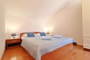 Postel nebo postele na pokoji v ubytování Apartments by the sea Vela Luka, Korcula - 4449