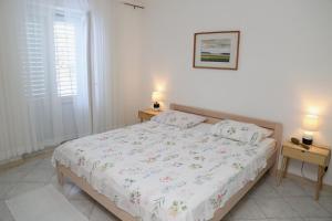 Postel nebo postele na pokoji v ubytování Apartments by the sea Lumbarda, Korcula - 4446
