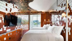Ένα ή περισσότερα κρεβάτια σε δωμάτιο στο Little Shelter Hotel Chiangmai +103 φωτογραφίες