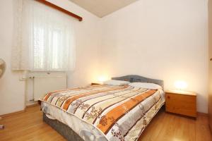 Ένα ή περισσότερα κρεβάτια σε δωμάτιο στο Rooms with a parking space Lumbarda, Korcula - 4436