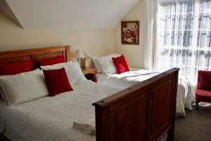 Postel nebo postele na pokoji v ubytování The Loft Bed and Breakfast + 25 fotografií