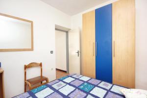 Posteľ alebo postele v izbe v ubytovaní Apartment Lumbarda 4440a