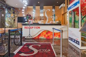 a exhibit of a rec room with a bike on a ramp at RedDoorz Premium near Bandung Station in Bandung +46 photos