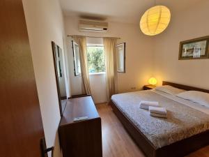 Postel nebo postele na pokoji v ubytování Apartments with parking spaces Orebic, Peljesac - 4500
