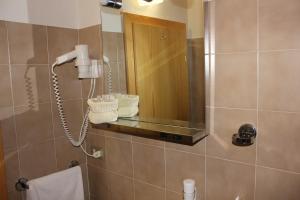 Ένα μπάνιο στο Hotel Mignon