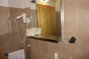 Koupelna v ubytování Hotel Mignon