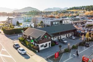 an overhead view of a small town with a street at Aspiring Lodge Motel in Wanaka