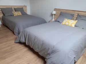 Postel nebo postele na pokoji v ubytování Home Shanti