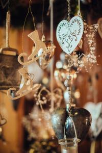 a christmas ornament with a heart and stars at Hotel Cristallino d'Ampezzo in Cortina dʼAmpezzo