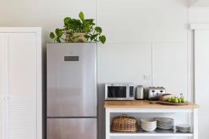 Η κουζίνα ή μικρή κουζίνα στο Bungalow105 +23 φωτογραφίες
