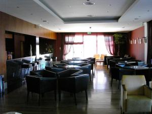 Uma área de estar em Hotel Lusitania Congress & Spa