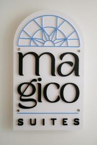 a sign for a shop with a window at Magico Suites City Heart Luxury Appartments in Alexandroupoli