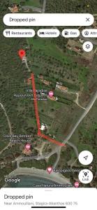 a map of a parking lot with a red line at Anna’s Olive Grove in Ammouliani