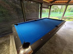 a pool table in the middle of a room at Holistay Forest Villa I 34 Pax I Gathering I Team Building I Wedding in Hulu Yam Baharu