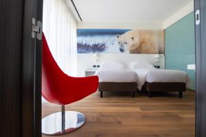 Postel nebo postele na pokoji v ubytování Life Hotel