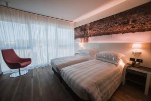 Postel nebo postele na pokoji v ubytování Life Hotel