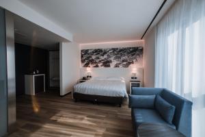 Postel nebo postele na pokoji v ubytování Life Hotel