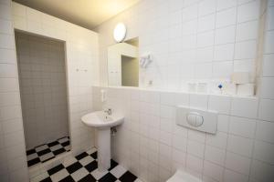 Koupelna v ubytování Hotel Praha