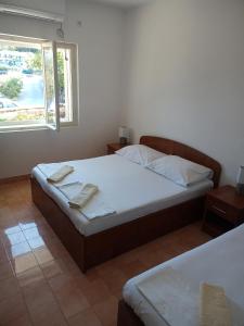 Postel nebo postele na pokoji v ubytování Apartments by the sea Cove Vela Prapratna (Peljesac) - 4515 + 26 fotografií