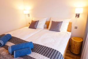 Letto o letti in una camera di MALINOWA OSADA