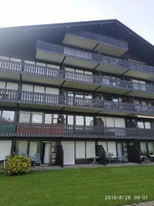 a large building with balconies on the side of it at PfiffiApart in Schöfweg