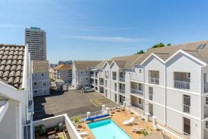 an aerial view of an apartment complex with a pool at Sutton Place 57 in Cape Town