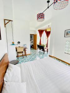 Giường trong phòng chung tại Hotel De Condor