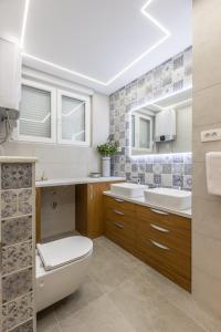 Kúpeľňa v ubytovaní Apartment FORTUNA