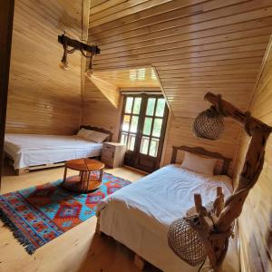 A bed or beds in a room at Selin Yaşam Evi Még 37 kép