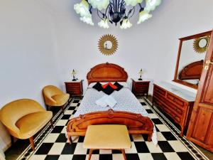 Posteľ alebo postele v izbe v ubytovaní Velez Nazari Casa Molina
