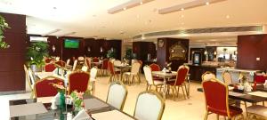 Un restaurant sau alt loc unde se poate mânca la Tourist Hotel