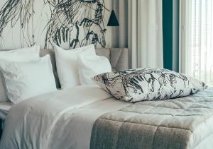 Postel nebo postele na pokoji v ubytování Hotel AX
