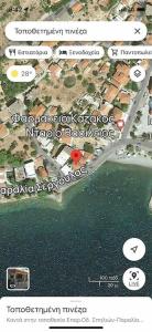 a map of a city and the water at Seaside Apartment in Glyfada-Trizonia in Glyfada Fokidas