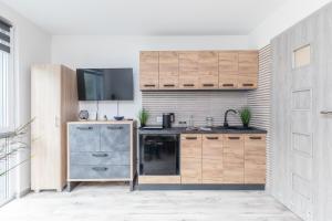 Kuchyňa alebo kuchynka v ubytovaní SuperApart Batorego 18 MiniStudio