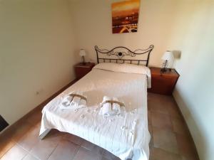 Posteľ alebo postele v izbe v ubytovaní APARTAMENTO 2 DORMITORIOS.URB PLAYA VERDE