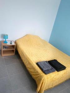 מיטה או מיטות בחדר ב-Chambres d'hôtes Drome